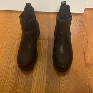 Black boots, they hit around the ankle